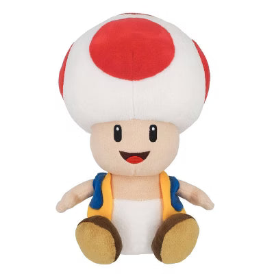 Plush toy resembling a character with a red cap and white body on a white background