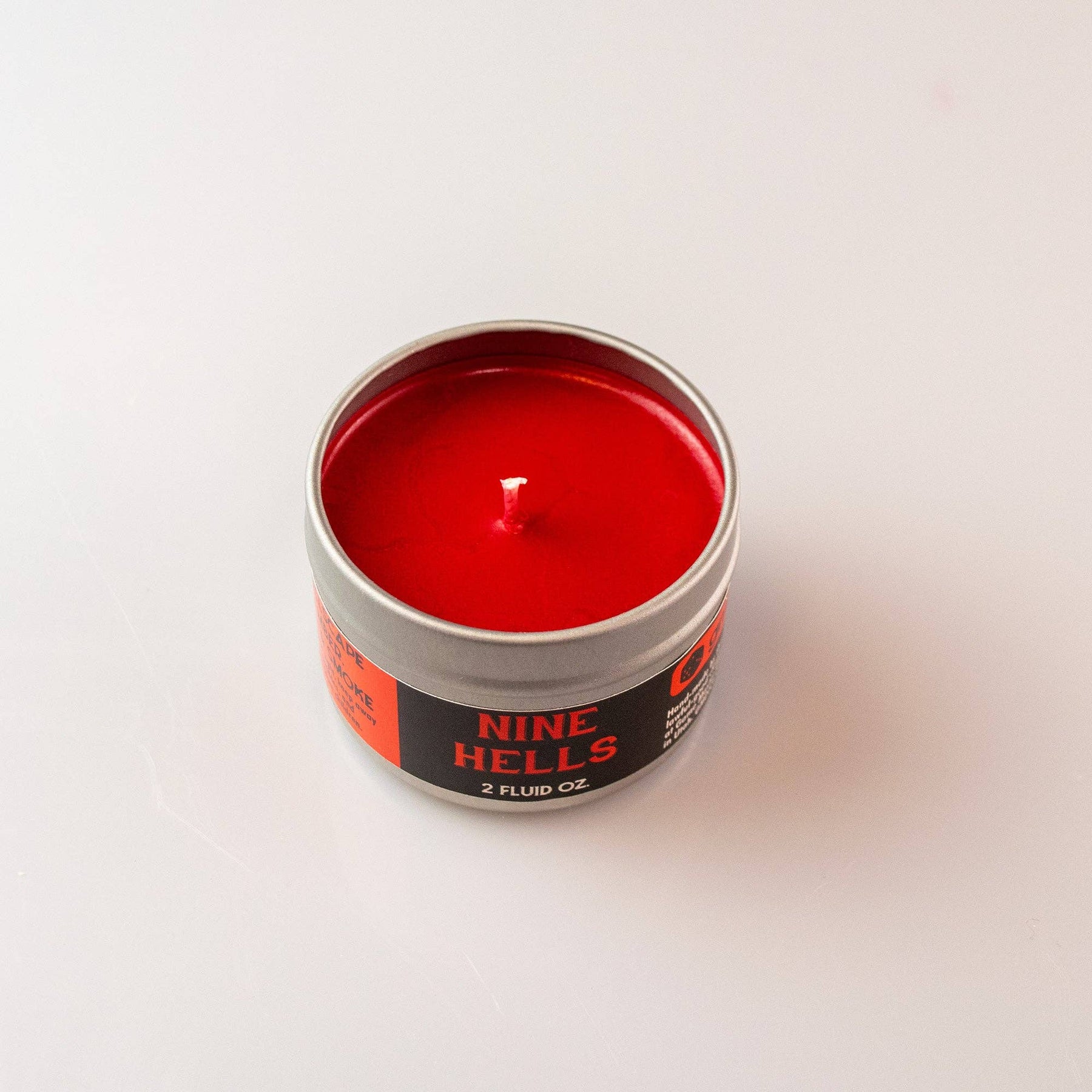 Game Master Dice Decor > Candles Nine Hells Gaming Candle: 8oz Tin 03211260