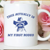 House of Rodan Home > Drinkware > Mugs My First Rodeo Raccoon - Funny Weird Animal Mug 17946441003260 17946441003260