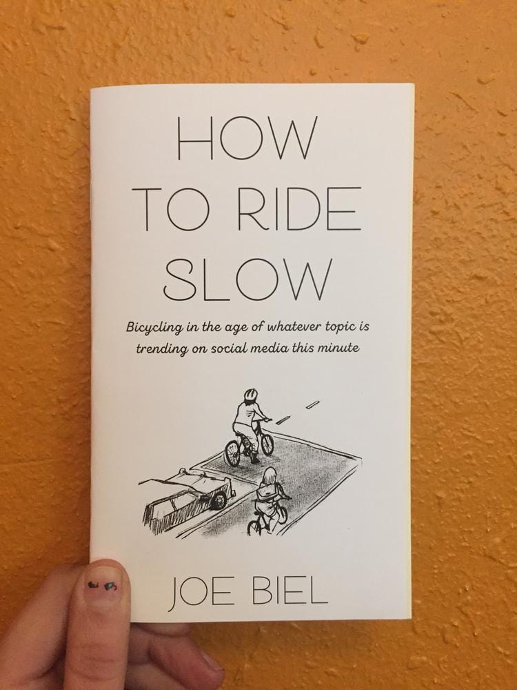 Microcosm Publishing Books > Zines How to Ride Slow: Bicycling in the age of whatever topic is trending on social media this minute (Zine) 9781621068150