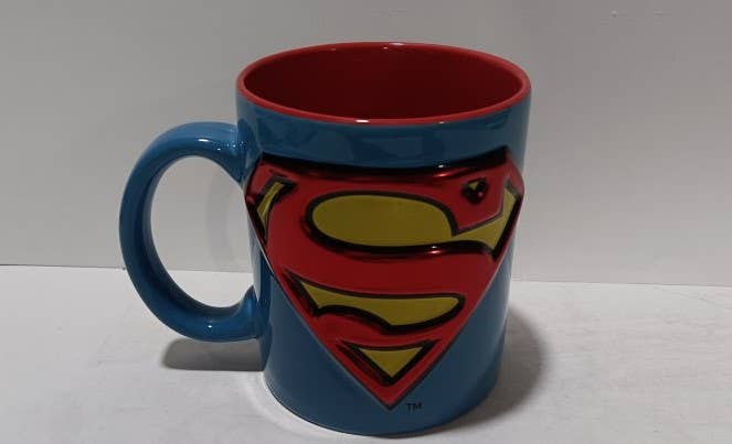 Silver Buffalo Home > Drinkware > Mugs Superman Logo Icon Embossed Foil 20oz Ceramic 840298952069 SP190334V : SP190334V-04024SB
