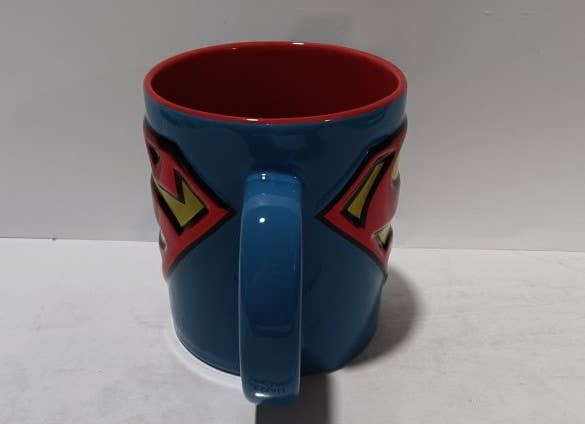 Silver Buffalo Home > Drinkware > Mugs Superman Logo Icon Embossed Foil 20oz Ceramic 840298952069 SP190334V : SP190334V-04024SB